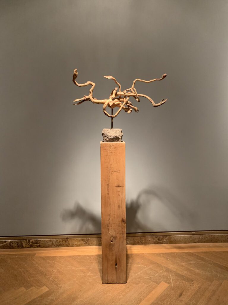 Ana Flores, Offerings, 1999, root, granite, copper. Courtesy of the artist.