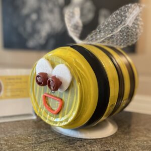 Art project made of recycled materials made to look like a bee,